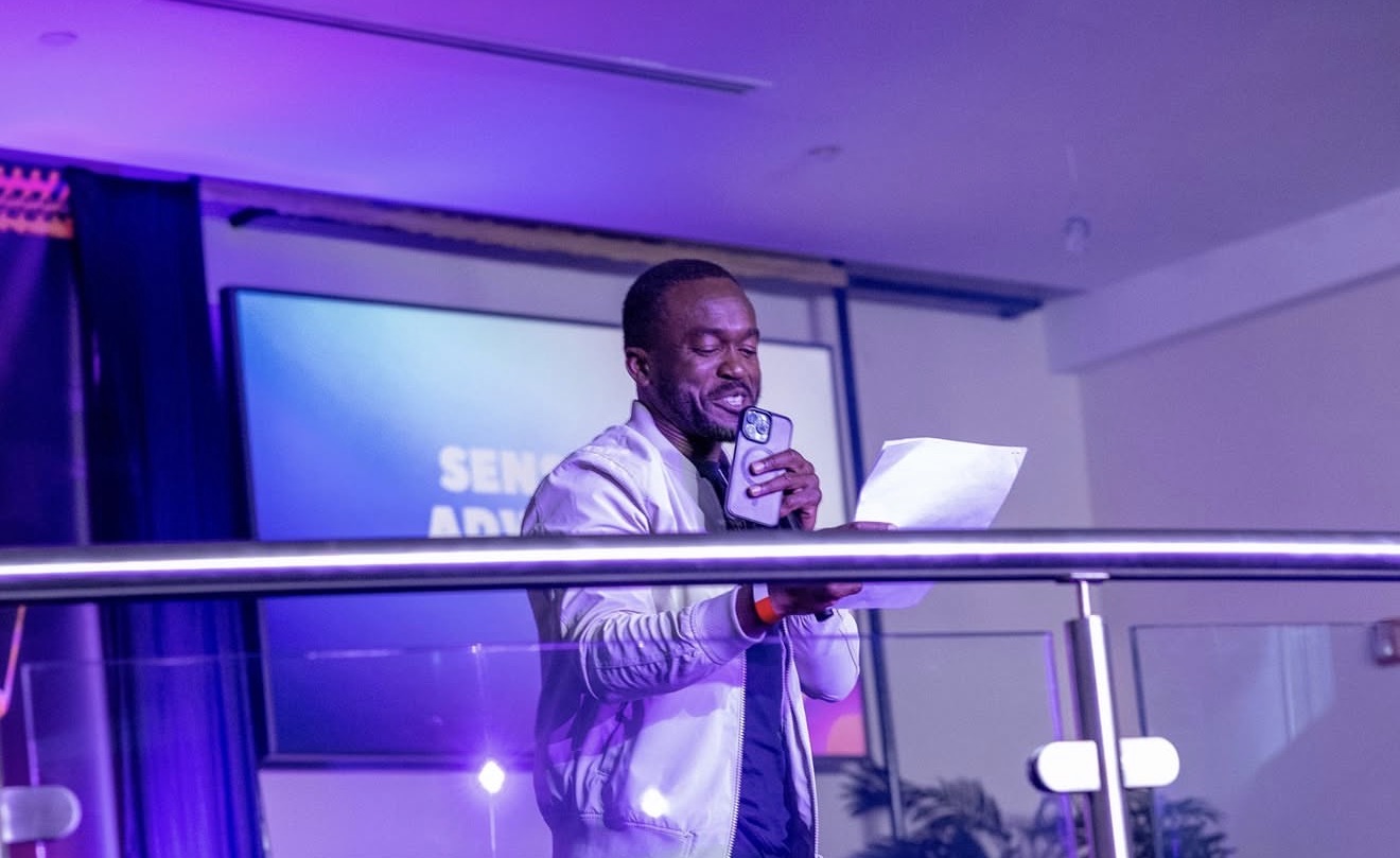Rehoboth Open Bible Church speaker sharing notes during a gathering